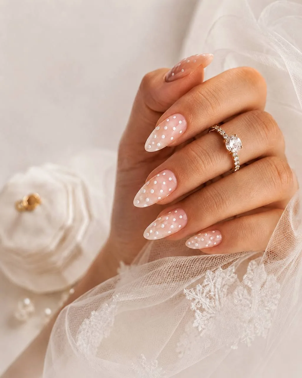 Soft bridal nails with pearl dot detail, veil and ring