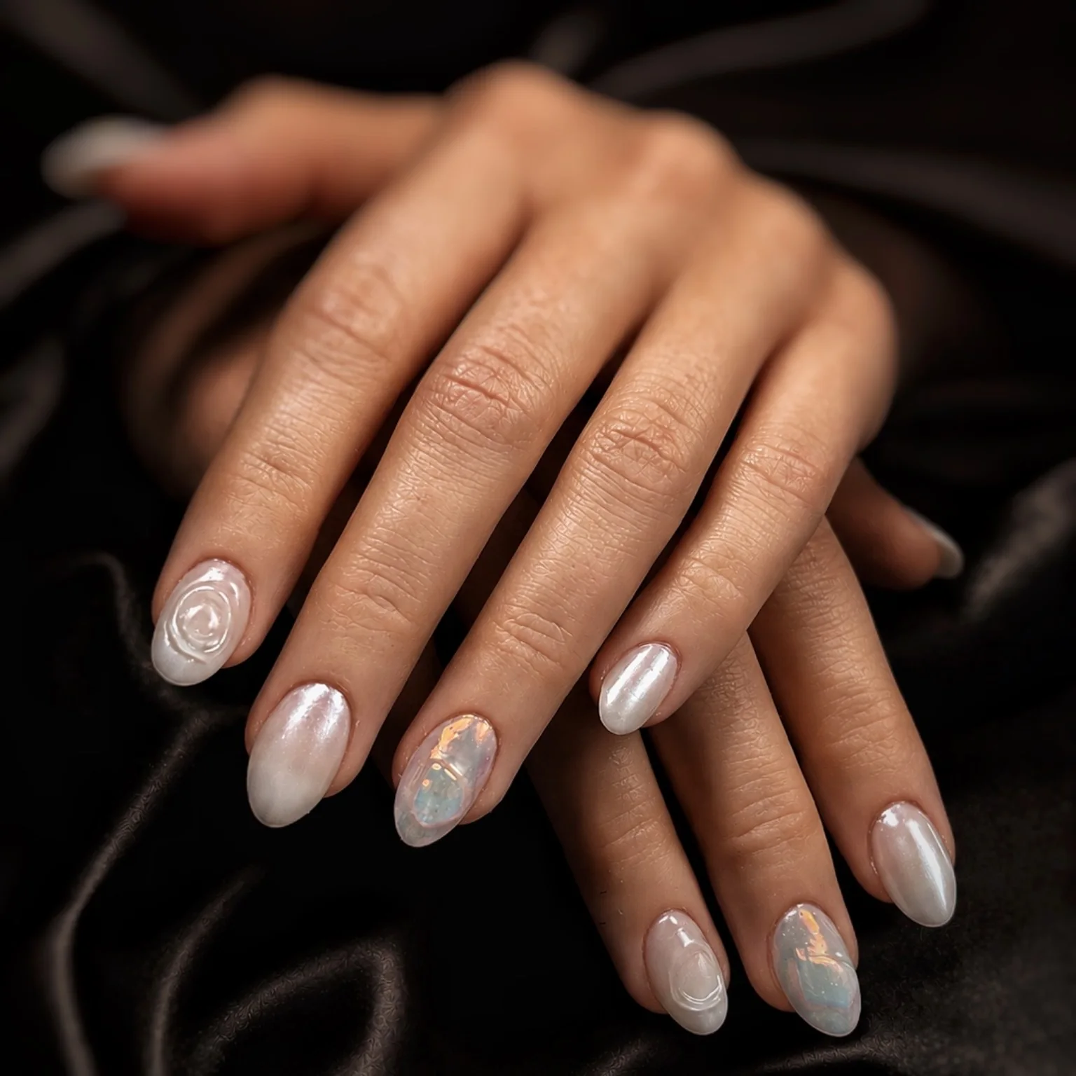 Ceramic pearl almond nails with soft art detail by Marzieh Nail Atelier